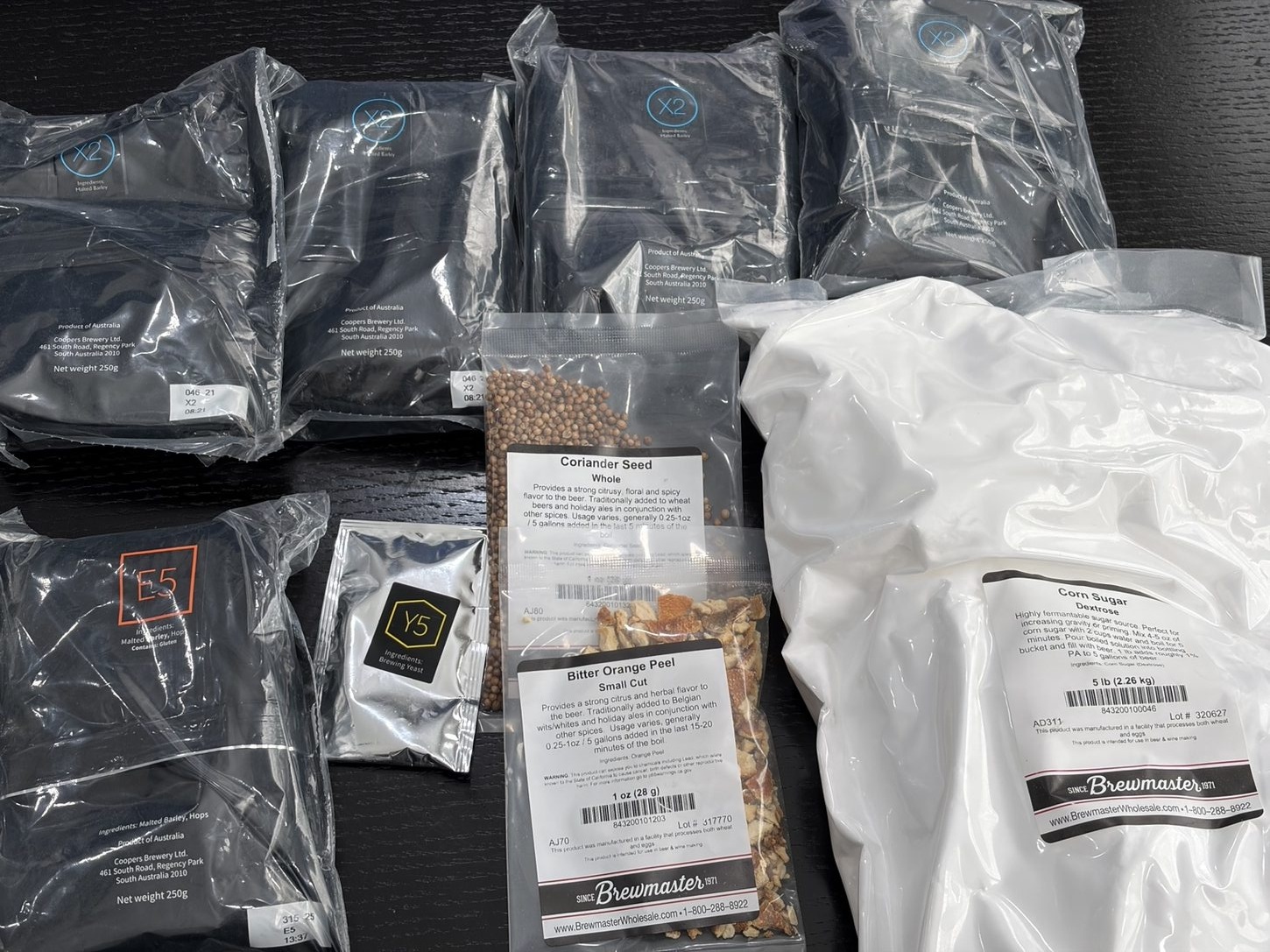 BrewArt ingredient packets with coriander, bitter orange peel, and corn sugar packaging
