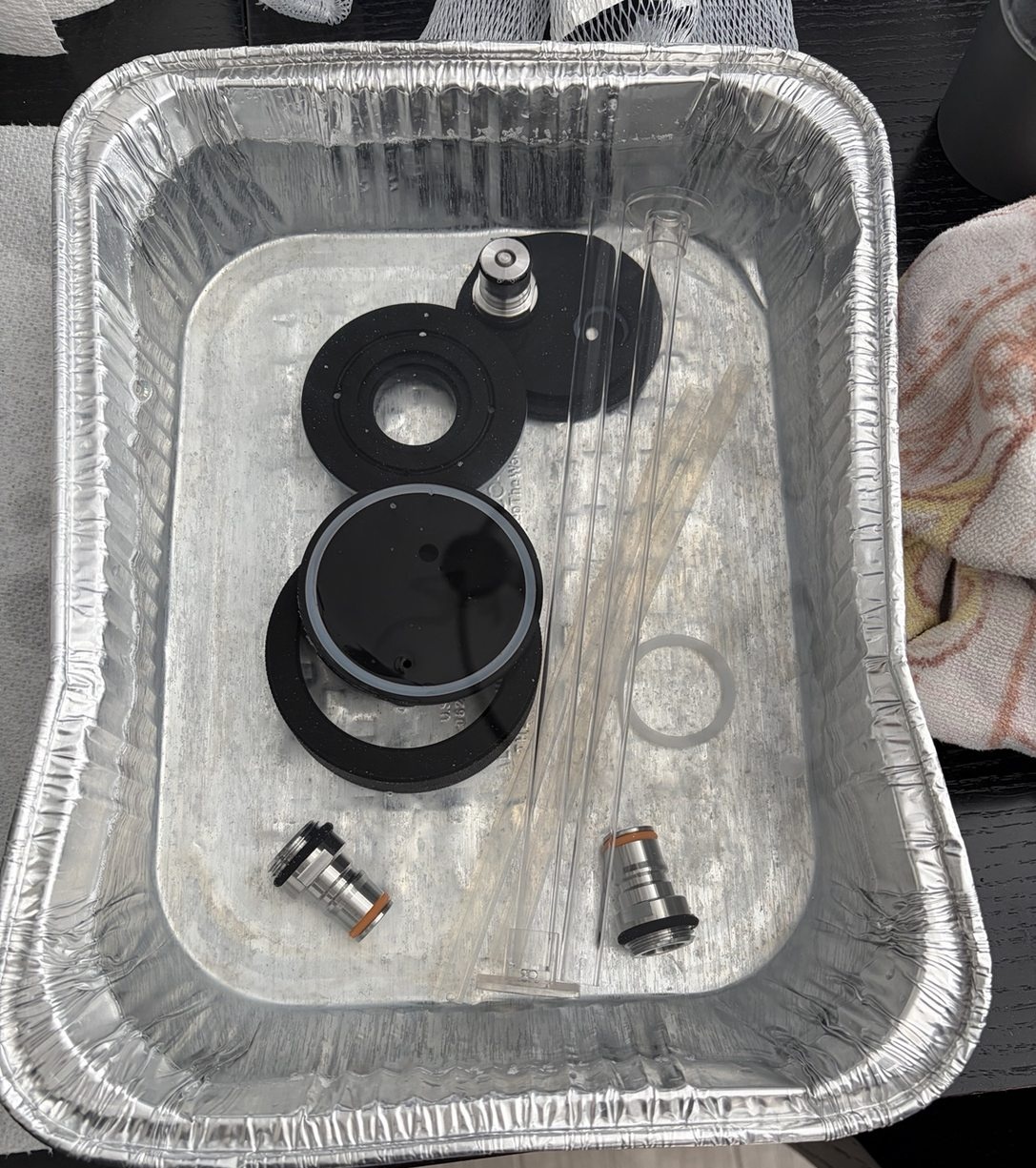 Kegging fittings and tubing set out before transfer
