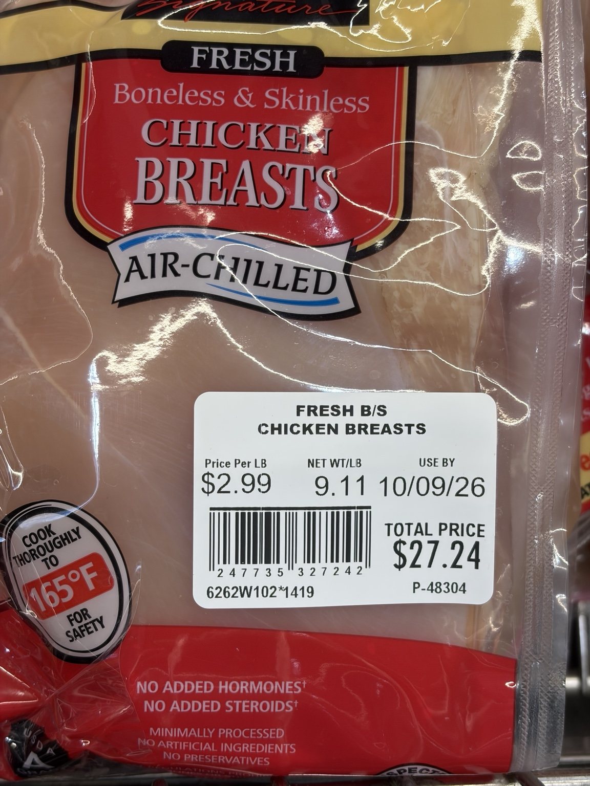 Costco air-chilled boneless skinless chicken breast priced at 2.99 dollars per pound