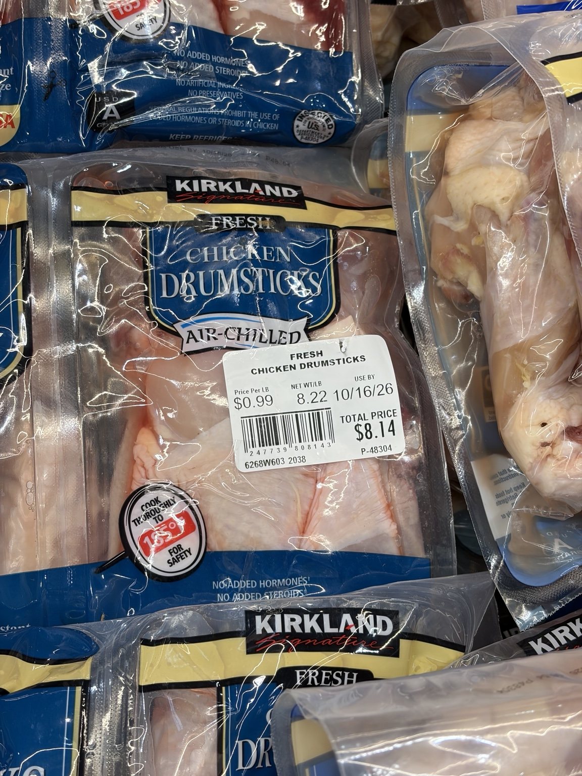 Costco air-chilled chicken drumsticks priced at 0.99 dollars per pound